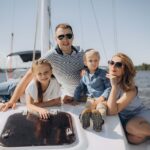 family-portrait-on-the-deck-of-the-yacht-9G63WLV.jpg
